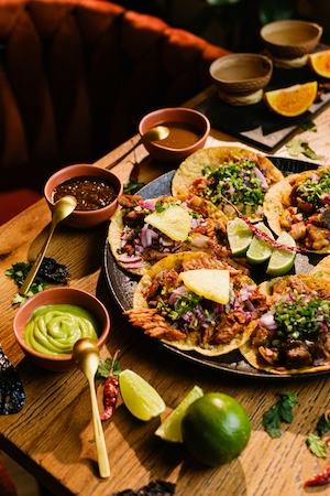 latin cuisine and sauces on table