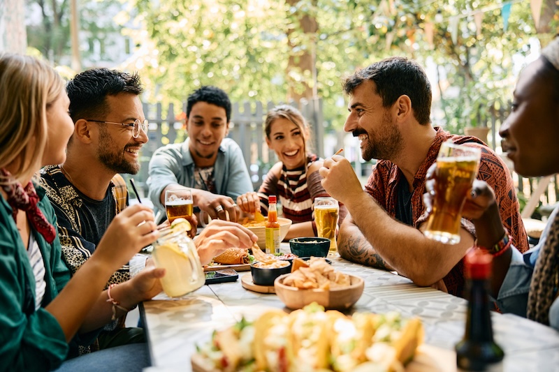 Group of friends eating Latin-style recipes with MSG