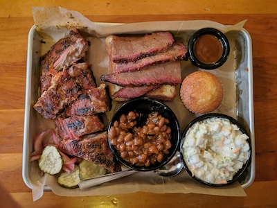 barbecued meat with sides